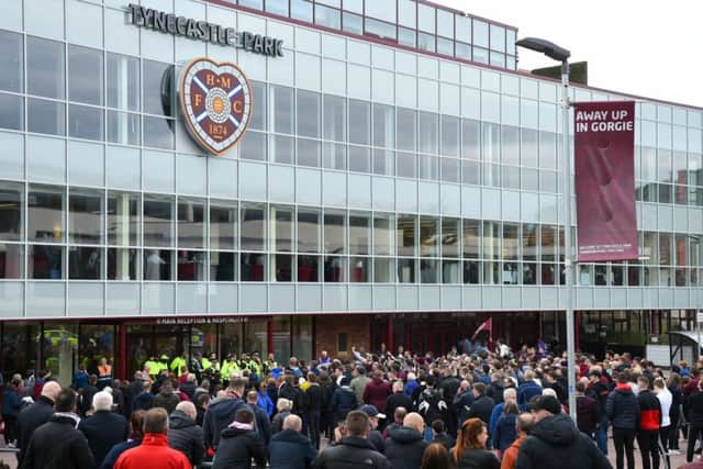 Hundreds of Hearts fans protest outside Tynecastle after their team's 3-2 defeat by Motherwell. Picture: Ross MacDonald/SNS