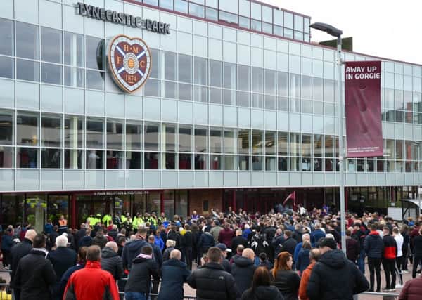 Hundreds of Hearts fans protest outside Tynecastle after their team's 3-2 defeat by Motherwell. Picture: Ross MacDonald/SNS