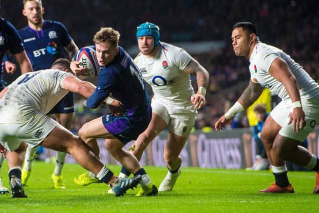 Darcy Graham in action for Scotland against England in the Calcutta Cup match during the 2019 Six Nations tournament