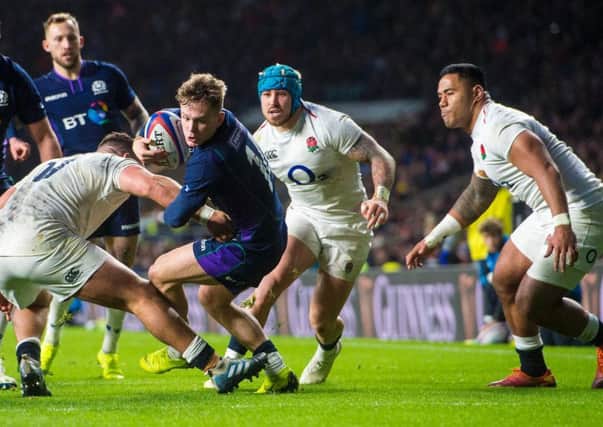 Darcy Graham in action for Scotland against England in the Calcutta Cup match during the 2019 Six Nations tournament