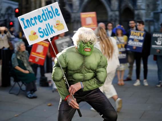 The Hulk impersonator also had a blonde wig and an 'Incredible Sulk' placard.