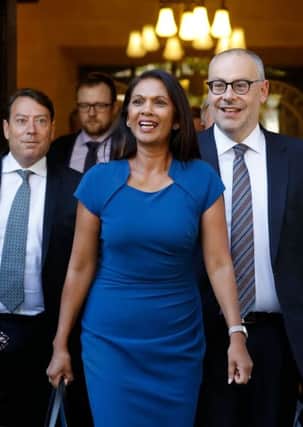 Anti-Brexit campaigner Gina Miller (C) leaves from the Supreme Court in central London, follwowing the first day of the hearing into the decision by the government to prorogue parliament on September 17, 2019. (Photo by Tolga AKMEN / AFP)TOLGA AKMEN/AFP/Getty Images