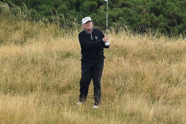 U.S. President Donald Trump plays a round of golf at Turnberry on his first official visit to the UK in 2018. (Picture: Getty Images)