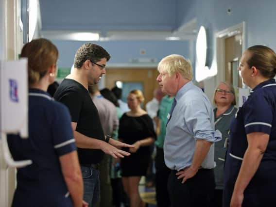 Prime Minister Boris Johnson was confronted by a furious father during a hospital visit. Picture: PA
