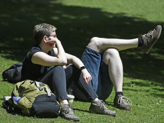 Sunbathers in Edinburgh's Princes Street Gardens. Picture: TSPL/Neil Hanna