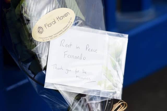 A message enclosed with flowers placed at Ibrox