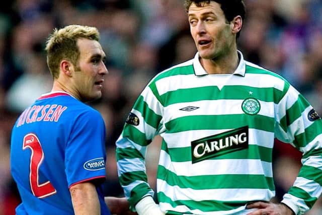 Keeping a close eye on Celtic striker Chris Sutton during an Old Firm clash
