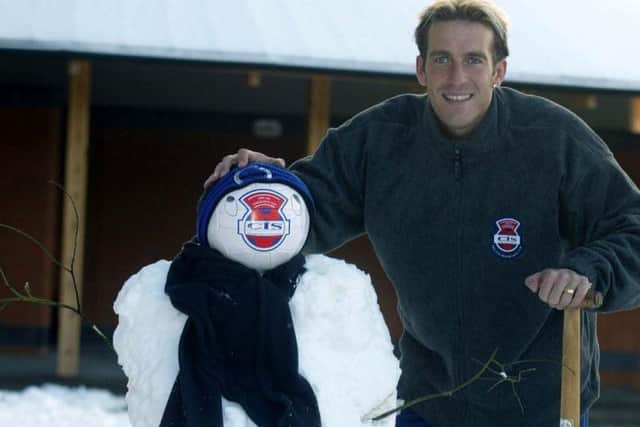Helping promote the CIS Cup in February 2003