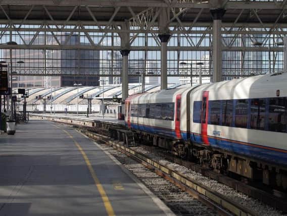 A man has died at Waterloo Station while working on a moving walkway.