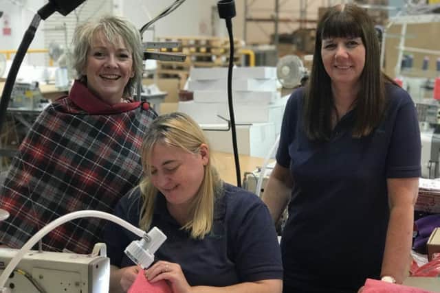 From left: Dogrobes' Margaret Reynolds with Haven PTS employees Alison Ellis and Barbara Marshall. Picture: Contributed