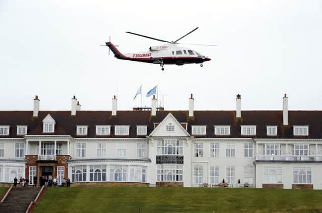 Donald Trump departs his Turnberry resort aboard his Sikorsky S-76B helicopter. Picture: Scott Heppell/AP