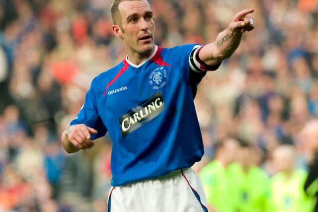 Fernando Ricksen in action for Rangers