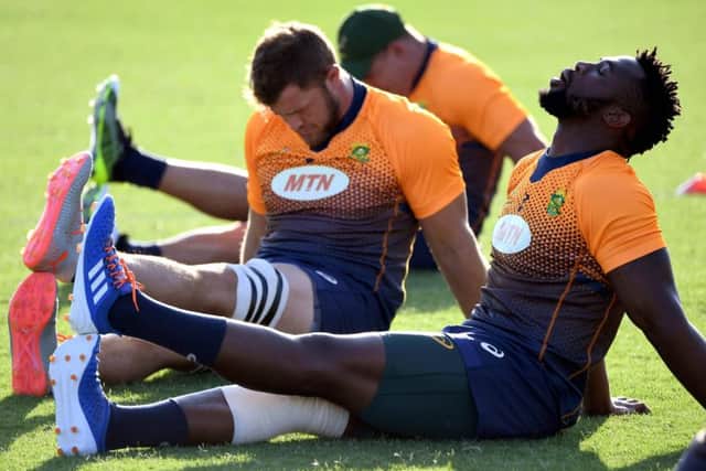 South Africa's flanker Siya Kolisi stretches during training. Picture: William West/AFP/Getty Images