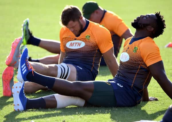 South Africa's flanker Siya Kolisi stretches during training. Picture: William West/AFP/Getty Images