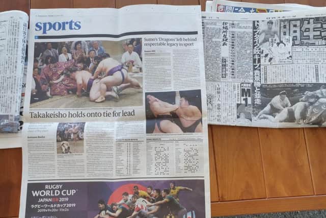 It may be the eve of the Rugby World Cup opening ceremony but Japan's sports pages are packed with Sumo action