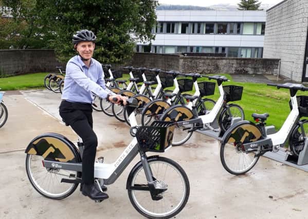 Alastair Dalton tries out a Forth Bikes electric bike at Stirling University. Picture: The Scotsman