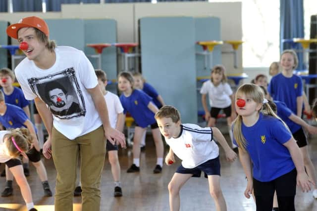 Stirling in his CBBC days, joining Davidson's Mains Primary pupils in Edinburgh for ZumbAtomic fori Comic Relief in 2011. Picture: Dan Phillips