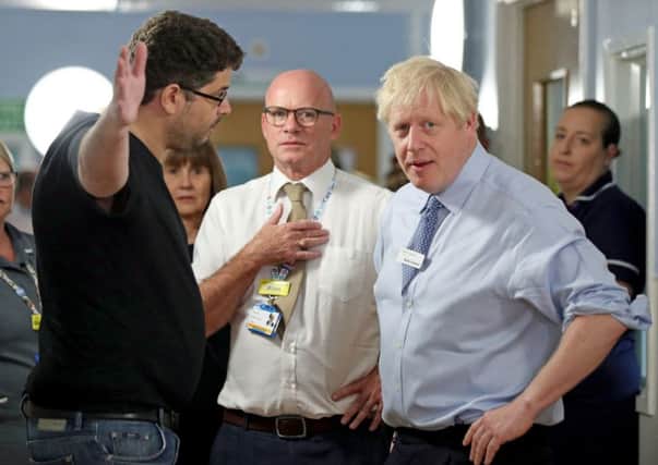 Democracy in action: a serious issue, passionately expressed by Omar Salem and given a fair hearing by Prime Minister Boris Johnson (Picture: Yui Mok/PA Wire)