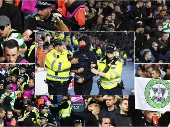 Feyenoord fans, including one wearing a Celtic shirt, clash with police at Ibrox while another supporter is removed from the stadium by police