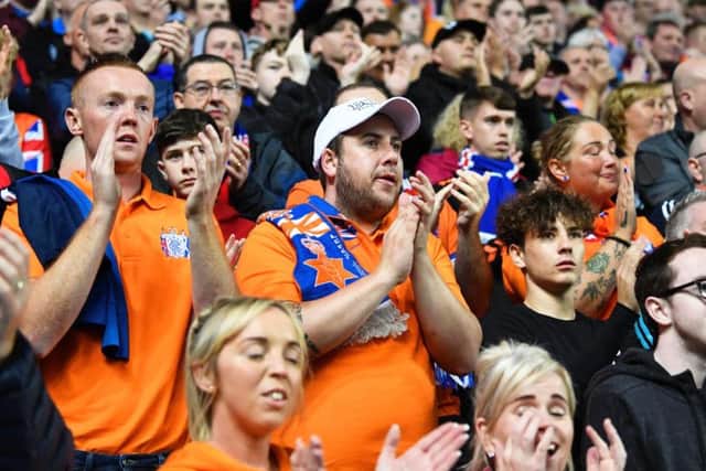 Rangers fans pay tribute to Fernando Ricksen. Picture: SNS
