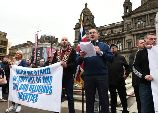 Demonstrators against the temporary march ban gather in Glasgow's George Square. The protest passed off peacefully. Picture: John Devlin