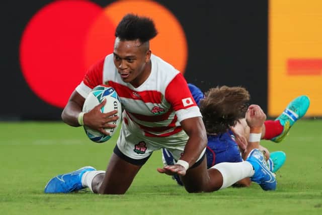 Japan's Kotaro Matsushima scores his team's fourth try in their victory against Russia. Picture: Mike Hewitt/Getty Images