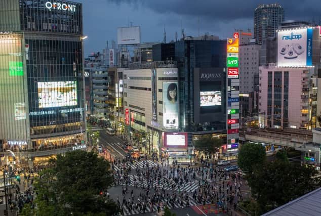 Tokyo's famous Shibuya Crossing, the world's busiest pedestrian passage. Picture: Chris McGrath/Getty Images