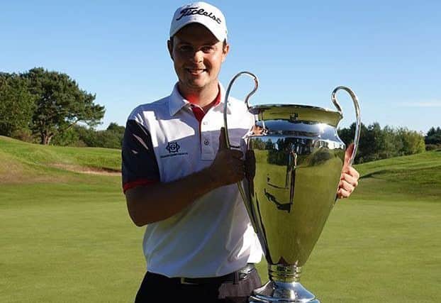 Jack McDonald shows off the Newmachar Golf Club Challenge trophy after his one-shot win at the Aberdeenshire course