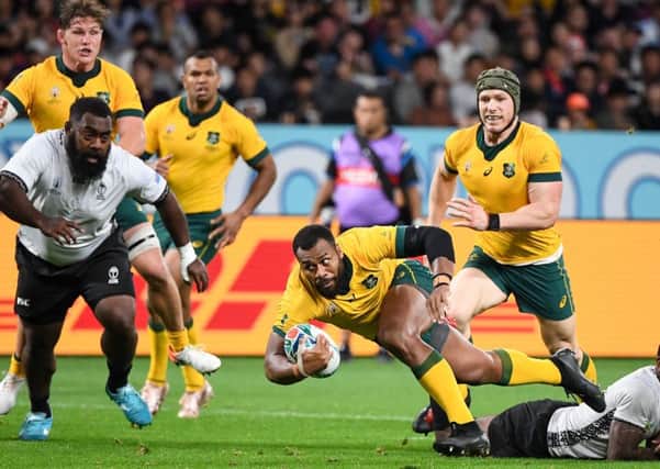 Australia's centre Samu Kerevi (C) is tackled. Pic: William West/ AFP/Getty Images