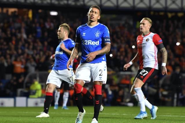 James Tavernier looks dejected after missing an early penalty against Feyenoord at Ibrox. Photograph: Rob Casey/SNS Group