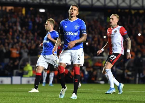 James Tavernier looks dejected after missing an early penalty against Feyenoord at Ibrox. Photograph: Rob Casey/SNS Group