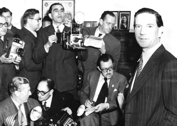 Harold Adrian Russell Philby, better known as Kim Philby (1912 - 1988), former First Secretary to the British Embassy in Washington, holds a press conference at his mother's home in Drayton Gardens, London, 8th November 1955. Photo by Keystone/Hulton Archive/Getty Images