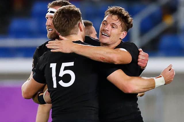 New Zealand's players celebrate a try against South Africa. Pic: Odd Andersen/AFP/Getty