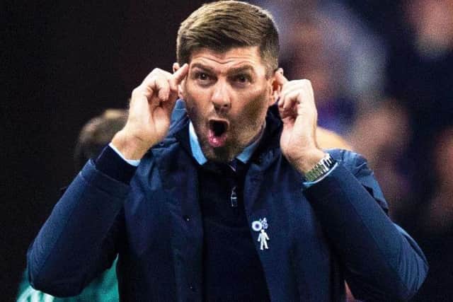 Steven Gerrard on the touchline.