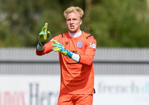 Robby McCrorie was in superb form despite Queen of the South's defeat. Picture: SNS.