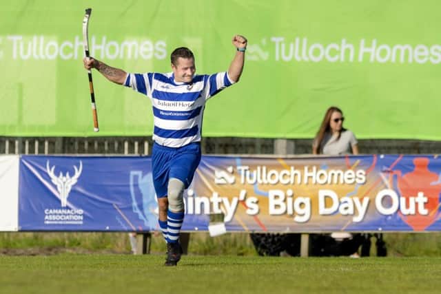 Newtonmore's Glen MacKintosh celebrates one of his two goals in the Camanachd Cup final win over Oban Camanachd. Picture: Neil G Paterson