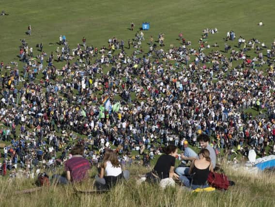 Youngsters gather for a rally in Holyrood Park at the UK Student Climate Network's Global Climate Strike in Edinburgh. Picture: PA