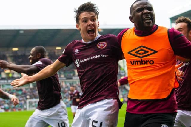 Hearts defender Aaron Hickey celebrates his winning goal. Picture: SNS