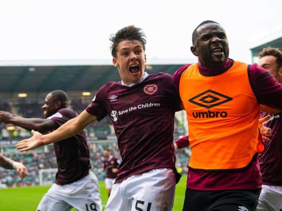 Hearts defender Aaron Hickey celebrates his winning goal. Picture: SNS