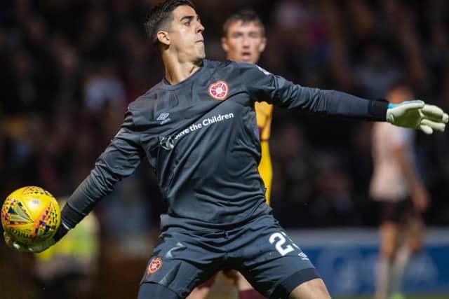 A strong presence behind the defence. Was beaten by Mallans long-range strike. The reaction of defenders suggested he could have done better.