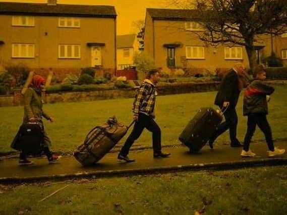 Syrian refugee families arrive at their new homes on the Isle of Bute on December 4, 2015 in Rothesay, Isle of Bute, Scotland. Picture: Getty Images