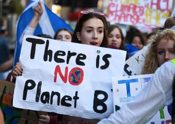 Protesters call for more action on climate change as they march through Glasgow earlier this year (Picture: John Devlin)