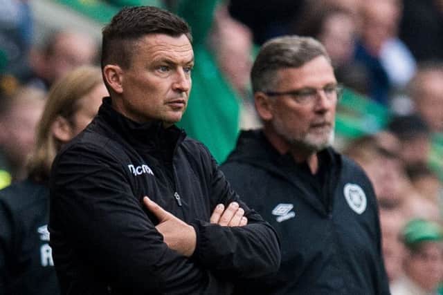 Hibs Manager Paul Heckingbottom, left, and Hearts boss Craig Levein during the derby. Picture: Ross Parker/SNS
