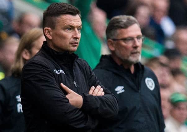 Hibs Manager Paul Heckingbottom, left, and Hearts boss Craig Levein during the derby. Picture: Ross Parker/SNS