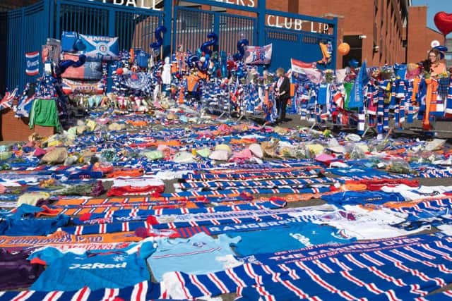Tributes laid out to Fernando Ricksen outside Ibrox.