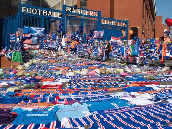 Tributes laid out to Fernando Ricksen outside Ibrox.