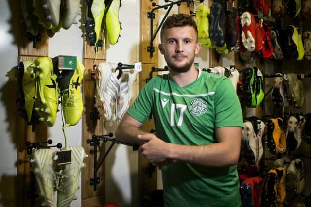 Tom James is eager for action after recovering from the ankle injury he sustained in Hibs opening league match. Picture: Bruce White/SNS