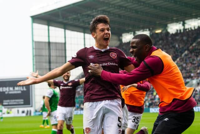 Aaron Hickey celebrates his derby winner - now he's set to be rewarded with a bumper new contract