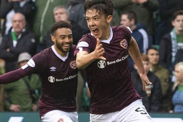 Aaron Hickey celebrates after scoring Hearts' winner at Easter Road.