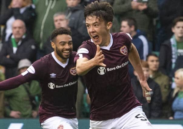 Aaron Hickey celebrates after scoring Hearts' winner at Easter Road.
